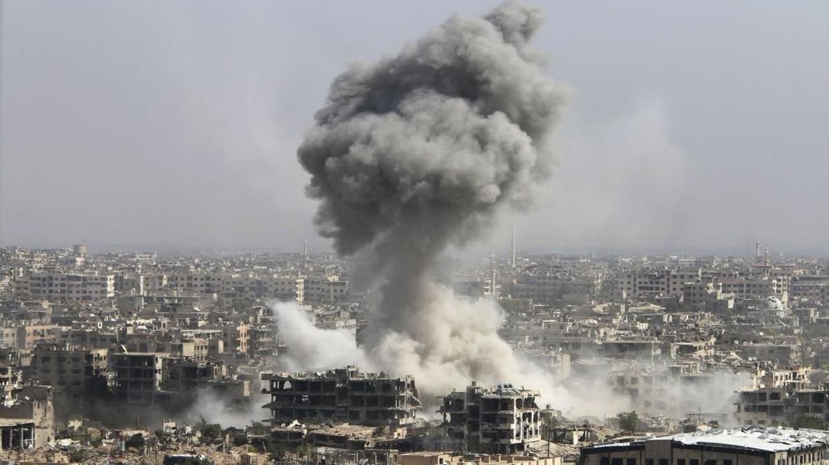 Smoke rises after shelling by the Syrian army in Jobar, a municipality in Damascus, Syria.