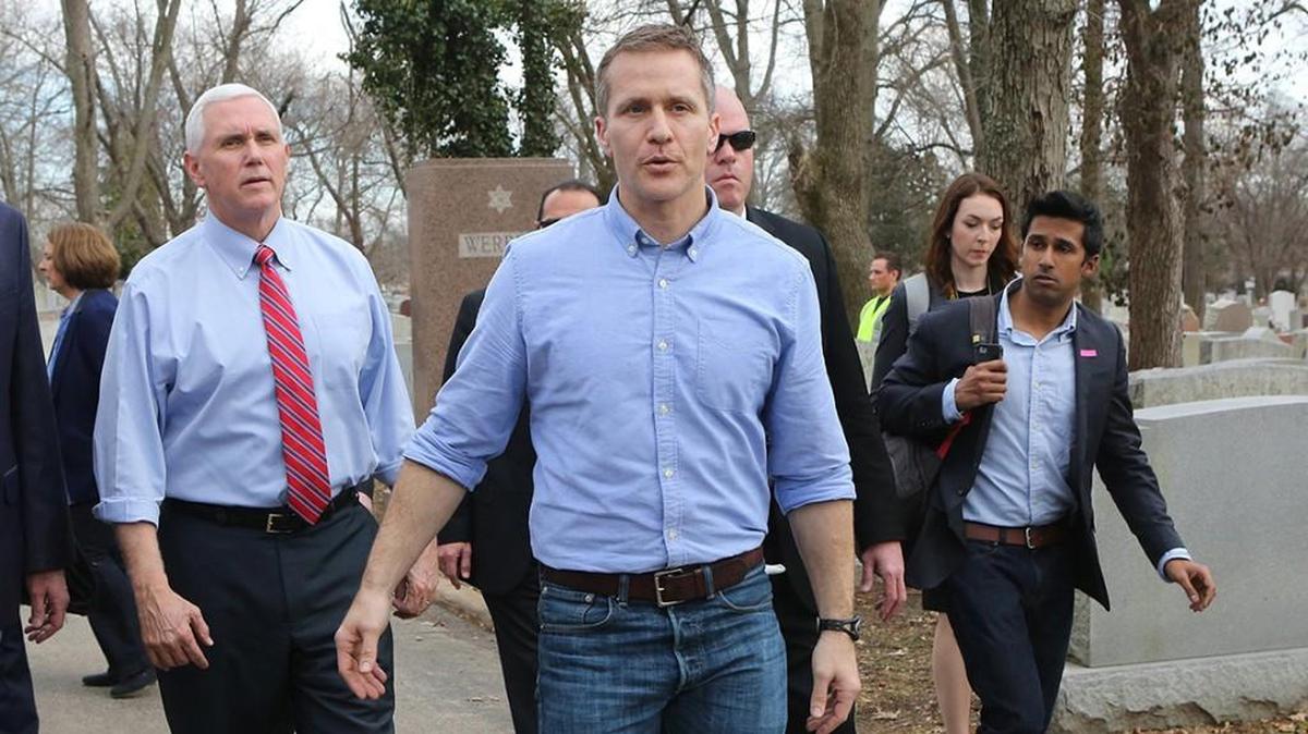 Vice President Mike Pence and Missouri Gov. Eric Greitens walked through the Chesed Shel Emeth Cemetery in University City, Mo., on Feb. 22, 2017, after vandals overturned more than 150 headstones.