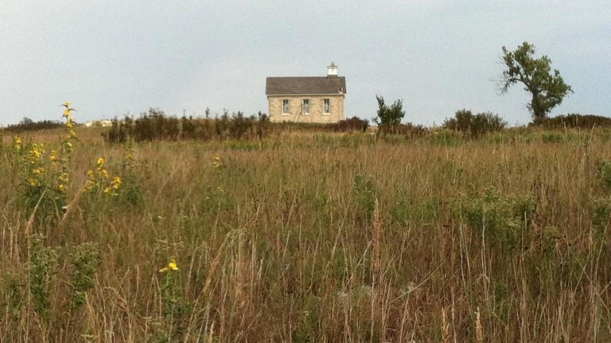 The one-room schoolhouse, like this one near Strong City, Kan., is long gone, but the size of rural schools and districts is a hot issue for the state Legislature.