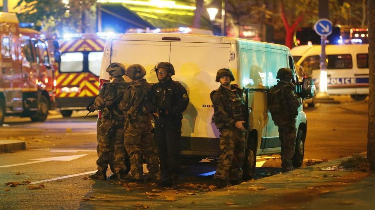 Security forces and police were outside the Bataclan concert hall in central Paris.
