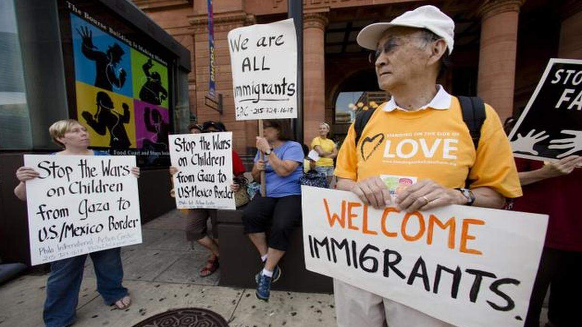
Protestors demonstrate July 18 in support of the recent immigrants entering the country from the southern border, near the Consulate of Mexico in Philadelphia. 
