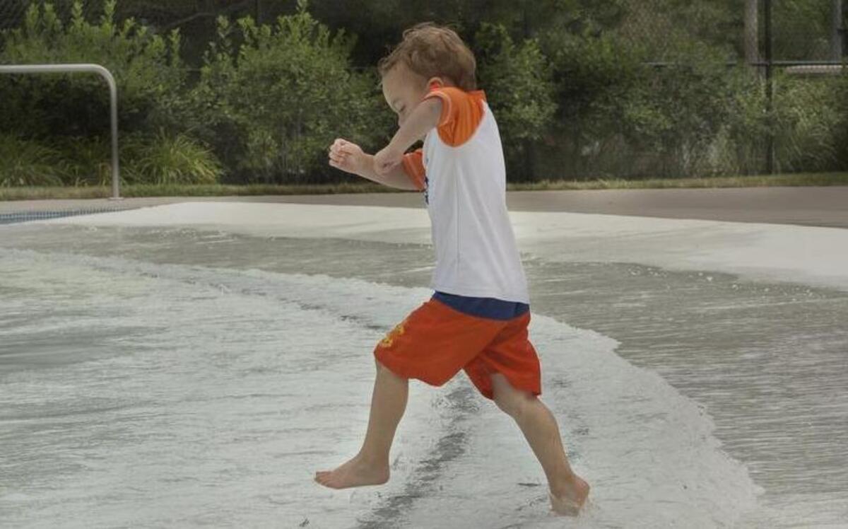 
Last July, Luke Church, 3, of Lenexa had the wave pool to himself at Splash Cove in Shawnee.
