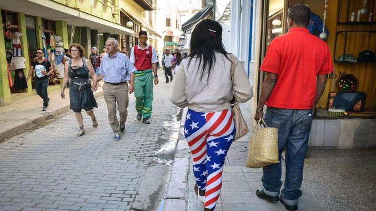 
A woman wearing U.S. flag leggings walked in Havana on Thursday, the day after President Barack Obama announced a move toward normalizing relations with Cuba.
