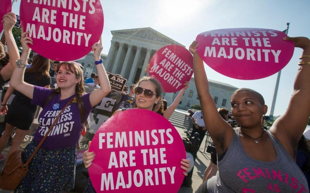 Abortion-rights supporters cheered Monday outside the U.S. Supreme Court in Washington, after it was announced the justices had struck down Texas laws restricting access to abortion.