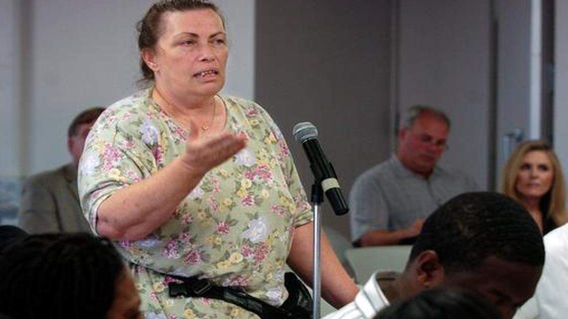 
Lynda Callon speaks up at a public meeting about the qualities she’d like to see in a police chief. 
