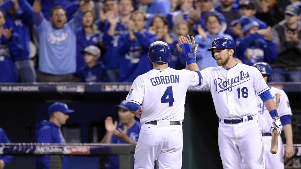 Some fans would love to keep Royals second baseman Ben Zobrist (right) and left fielder Alex Gordon (left) for the 2016 season.
