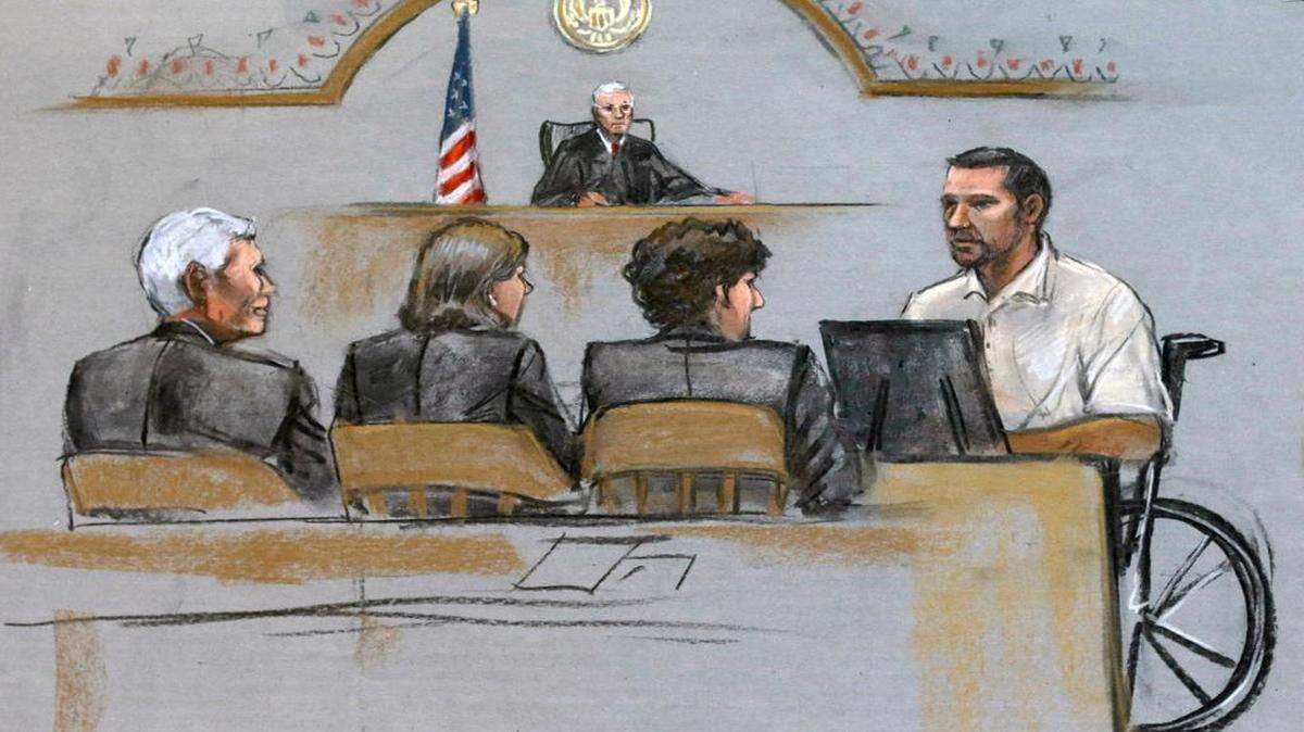
In this courtroom sketch, Boston Marathon bombing survivor Marc Fucarile (right) is depicted on the witness stand on Thursday during the penalty phase in the trial of Boston Marathon bomber Dzhokhar Tsarnaev, seated third from left with his lawyers.
