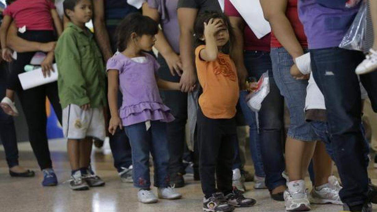 
Children who entered the U.S. illegally wait for a bus ride in Texas.
