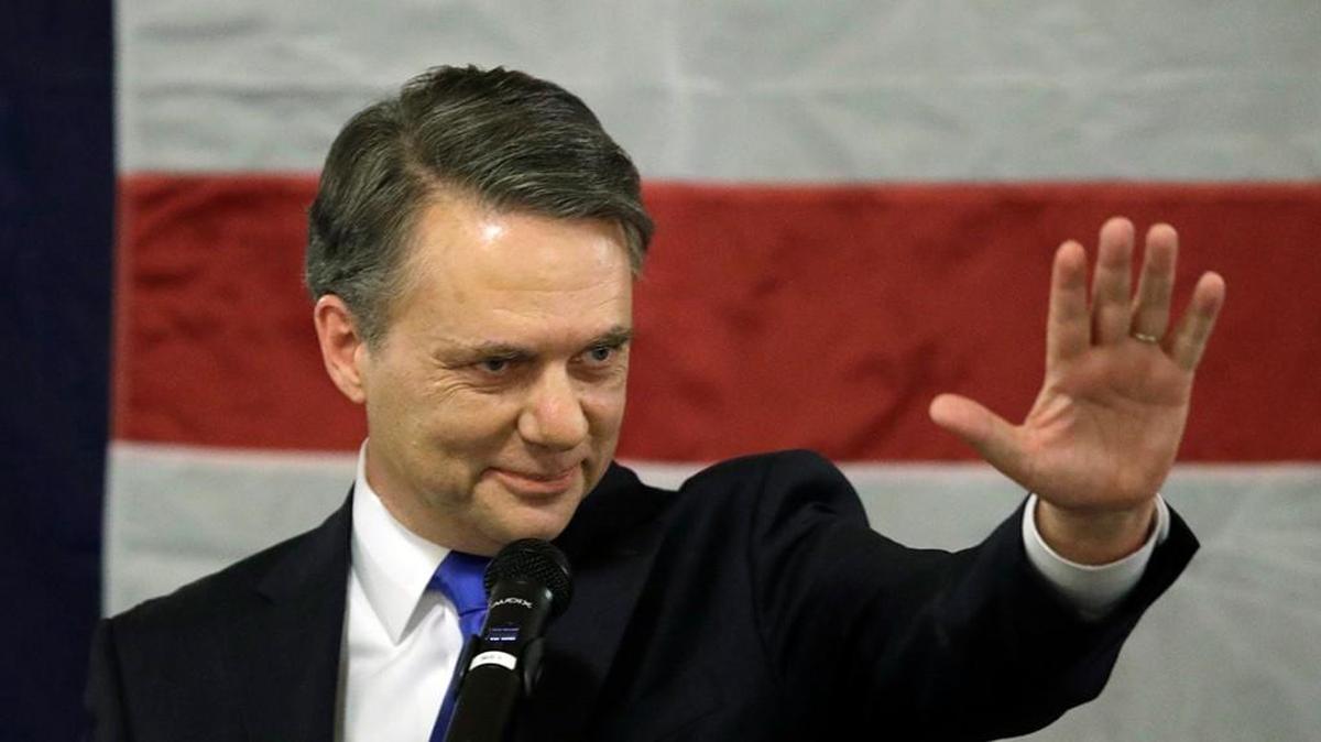 By remaining mum, the new governor is denying protections to certain state workers — and it may be because of Kris Kobach and the August primary.