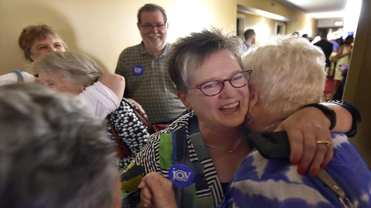 Joy Koesten (middle) of Leawood, was one of the big winners among moderate Republicans on Aug. 2, and she celebrated with her friends, family and supporters at the Marriott in Overland Park. Koesten won the 28th District seat in the Kansas House.