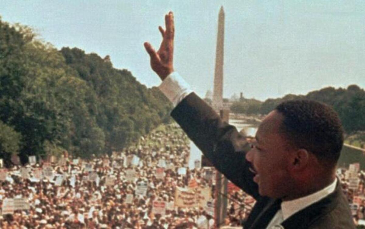 The Rev. Martin Luther King Jr. waved to the crowd at the Lincoln Memorial, where he delivered his famous “I Have a Dream” speech during the March on Washington for Jobs and Freedom on Aug. 28, 1963.