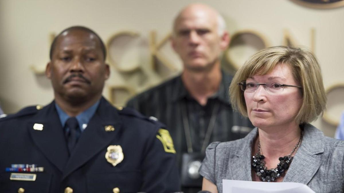 
In this file photo, Randy Hopkins, a former Kansas City deputy chief, stands with Jackson County Prosecutor Jean Peters Baker.