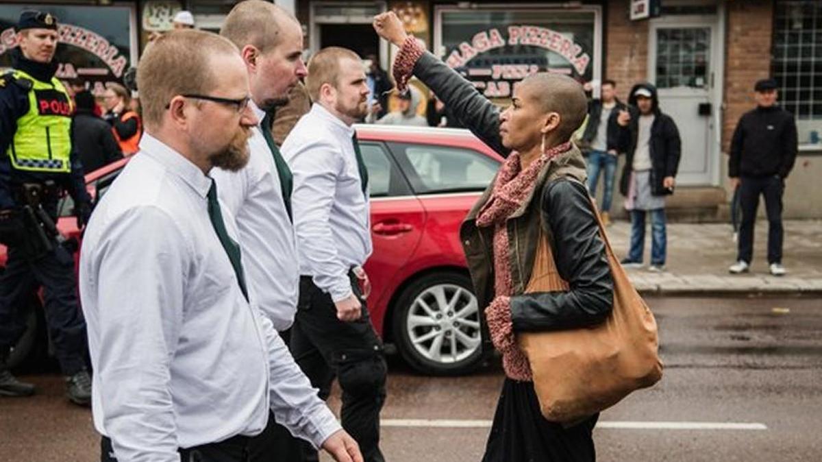 In a fight against far-right protesters, Tess Asplund blocked the path of about 300 neo-Nazis on May 1 as they marched through the streets of Borlange, Sweden.