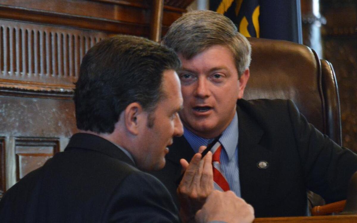 
Kansas Senate Vice President Jeff King (right), an Independence Republican, spoke with Sen. Ty Masterson, an Andover Republican, as the chamber discussed a bill to legalize fantasy sports leagues in Kansas. Both men supported the measure.
