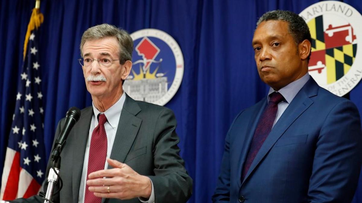 Maryland Attorney General Brian Frosh, left, accompanied by District of Columbia Attorney General Karl Racine, speaks during a news conference in Washington, Monday, June 12, 2017, to announce what they call a “major lawsuit” against President Donald Trump. The lawsuit cites Trump’s leases, properties and other business “entanglements” around the world as the reason for the suit, saying those posed a conflict of interest under a clause of the Constitution.