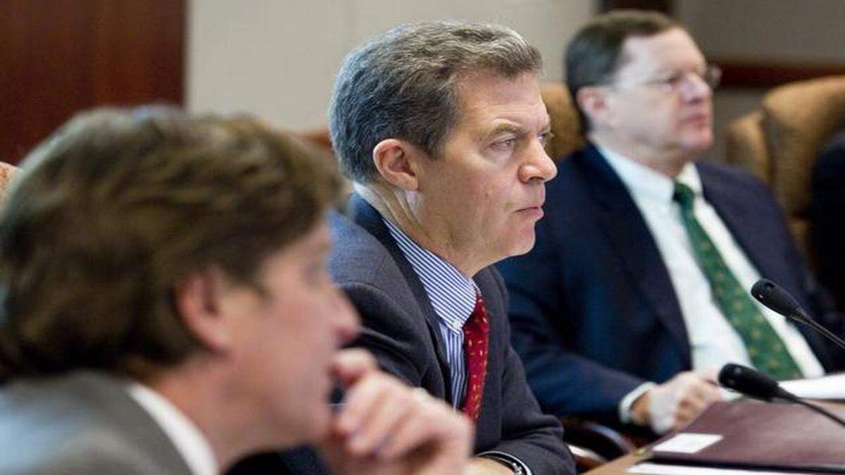 
Gov. Sam Brownback attends a Council of Economic Advisors meeting in Topeka. 
