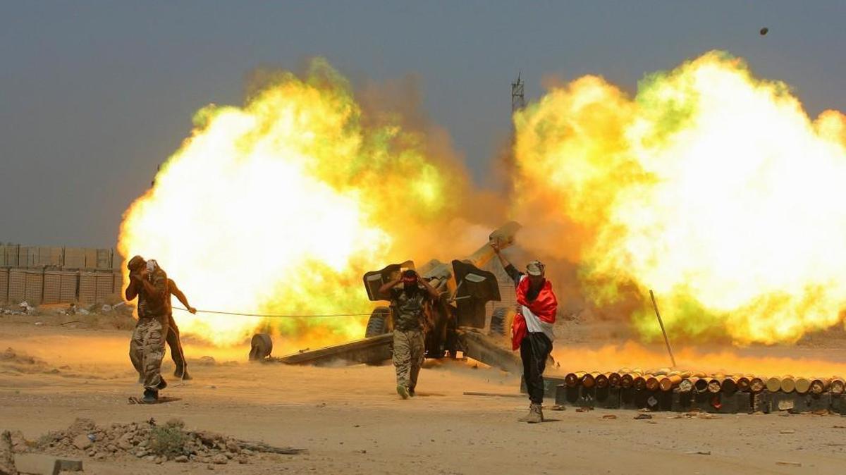 Iraqi security forces were among those firing artillery during a fight against Islamic State militants in late May in Fallujah, Iraq.