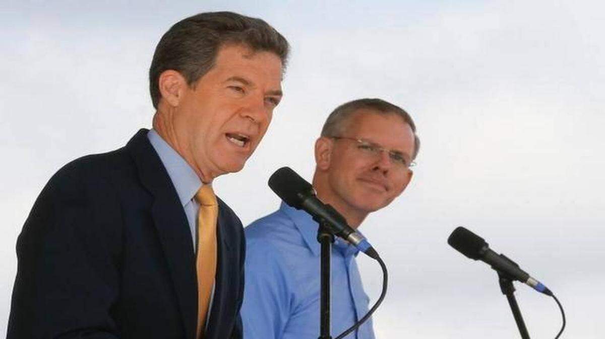 
Kansas Gov. Sam Brownback and challenger Paul Davis, shown here during a debate in September.