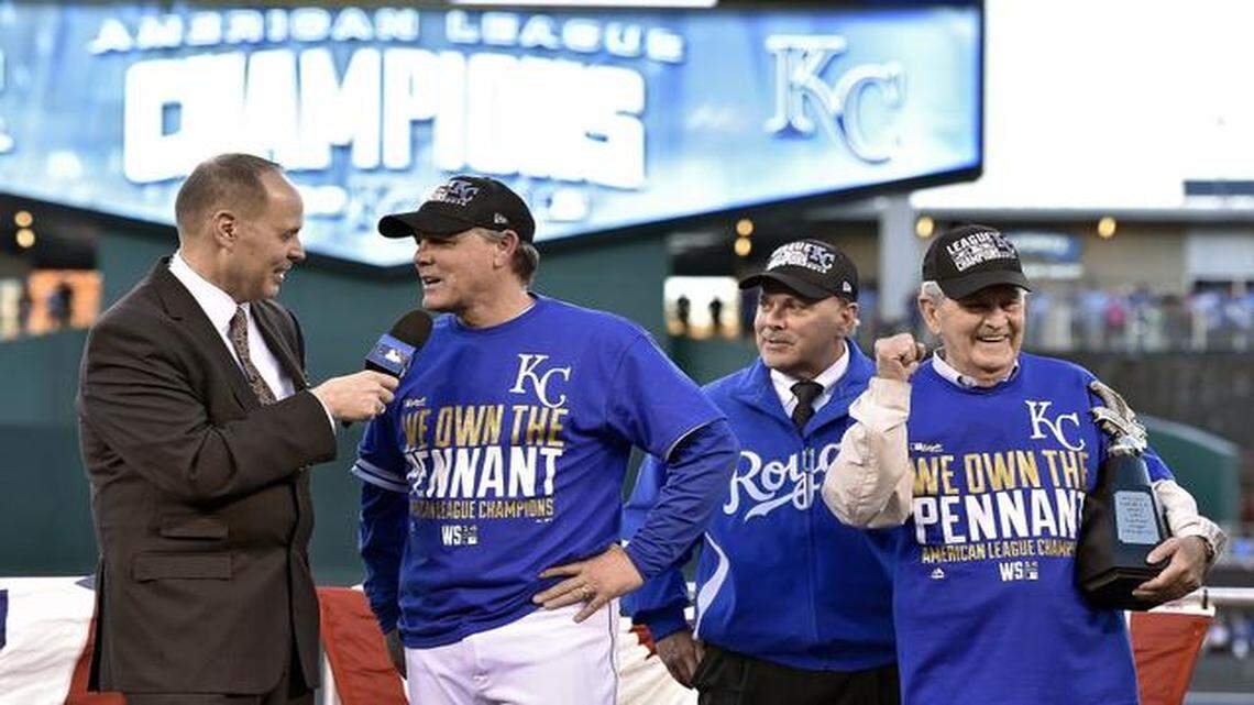
Kansas City Royals manager Ned Yost (second from left) was interviewed after guiding his club to the American League pennant last Wednesday at Kauffman Stadium. Team president Dan Glass stood next to Yost as owner David Glass pumped his fist while holding the championship trophy.
