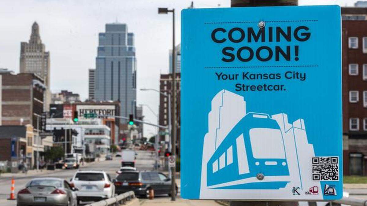 
Street signs promote the downtown streetcar line under construction. 
