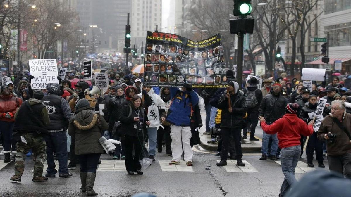 Protesters made their way up Chicago’s North Michigan Avenue on Friday as community activists and labor leaders held a demonstration billed as a “march for justice” in the wake of the release of video showing an officer fatally shooting Laquan McDonald.