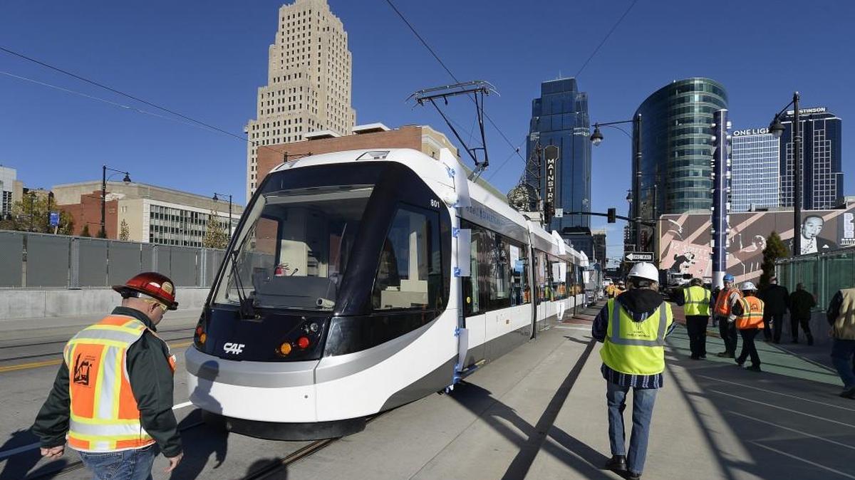 New parking rules require motorists to park inside the white lines that run along Kansas City’s streetcar route.