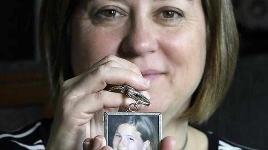 Michele Shanahan Demoss plans to again lobby the Missouri General Assembly for passage of what’s been called “Blair’s Law,” a statute that would designate as a felony the act of negligently discharging a firearm inside a municipality. Here the Kansas City woman holds a picture of her daughter, Blair Shanahan Lane.