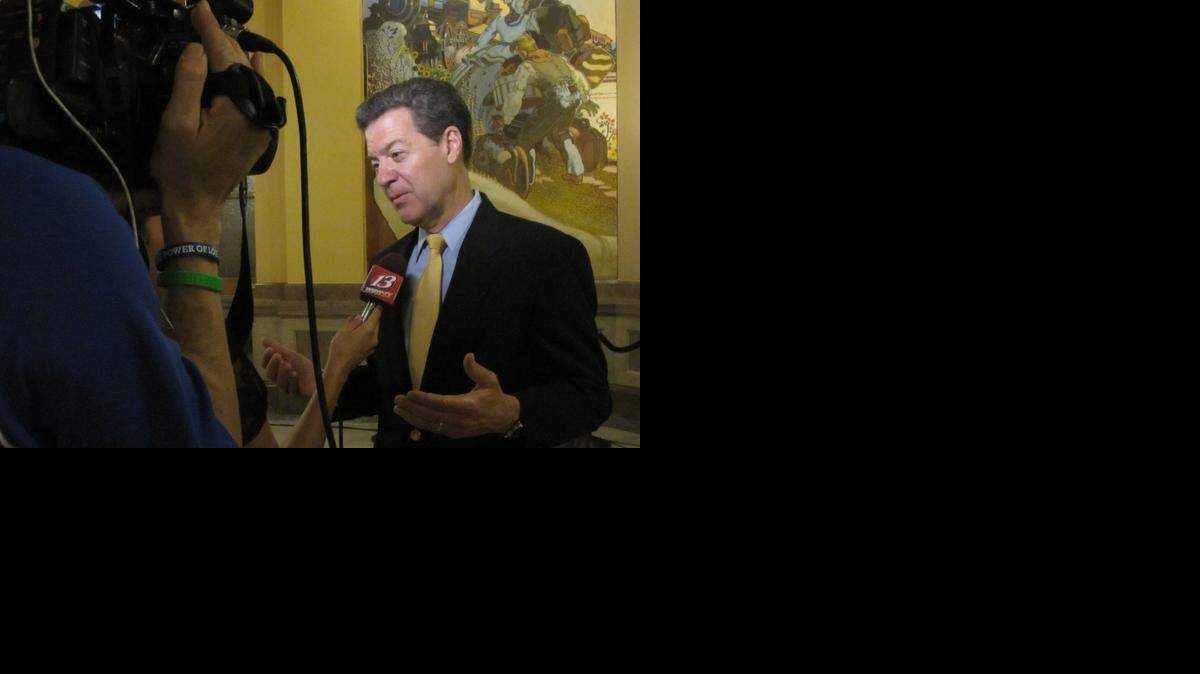 
Kansas Gov. Sam Brownback explained plans for expanding mental health treatment.
