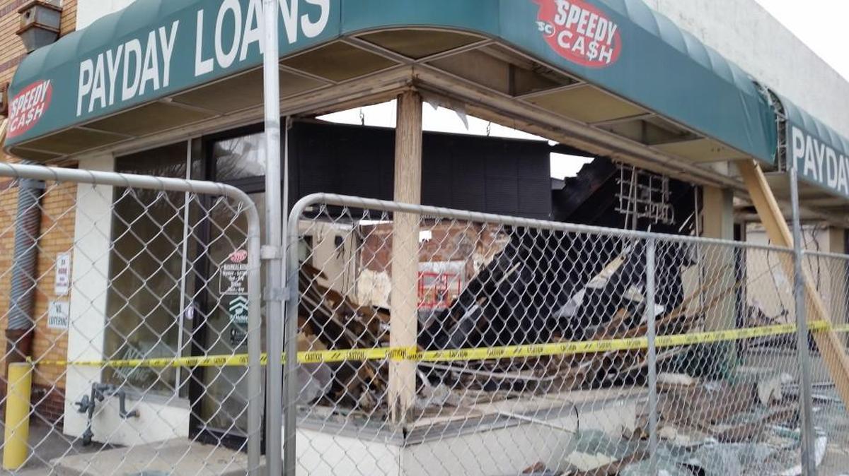 Speedy Cash should abandon its improbable attempt to rebuild this fire-damaged building at Independence Boulevard and Prospect Avenue.