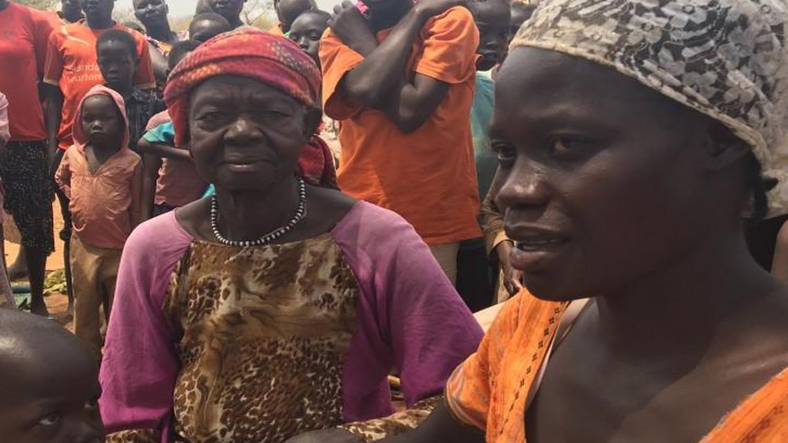 Halima Muzammil (right) fled her home in Kajo-Keji, South Sudan, with only her clothes and her children after watching her husband shot and killed by government soldiers in a country that the U.N. says is on the brink of genocide.