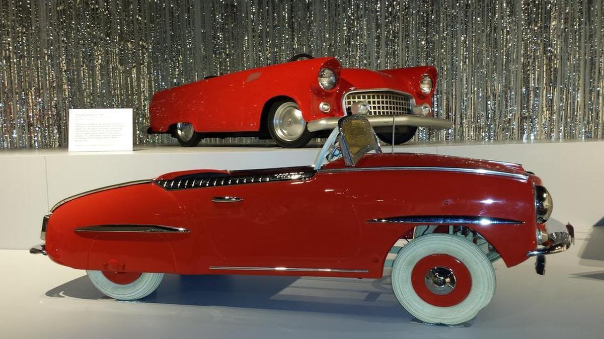 
A temporary exhibit at the National Museum of Toys and Miniatures features pedal-powered cars such as these racy models.
