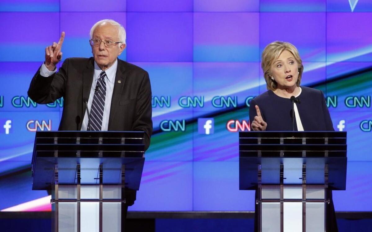 
Sen. Bernie Sanders and Hillary Clinton vied to make a point during the CNN Democratic presidential debate Tuesday in Las Vegas. 
