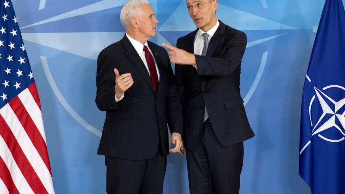 Vice President Mike Pence, speaking in Belgium, said the U.S. remains committed to the defense alliance created during the presidency of Harry Truman.