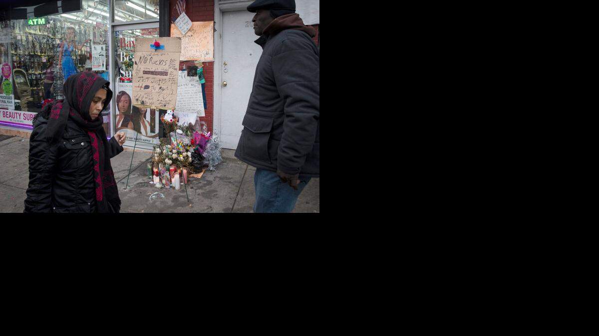 
A memorial marks the site of Eric Garner’s death on July 17 at the hands of New York police. 
