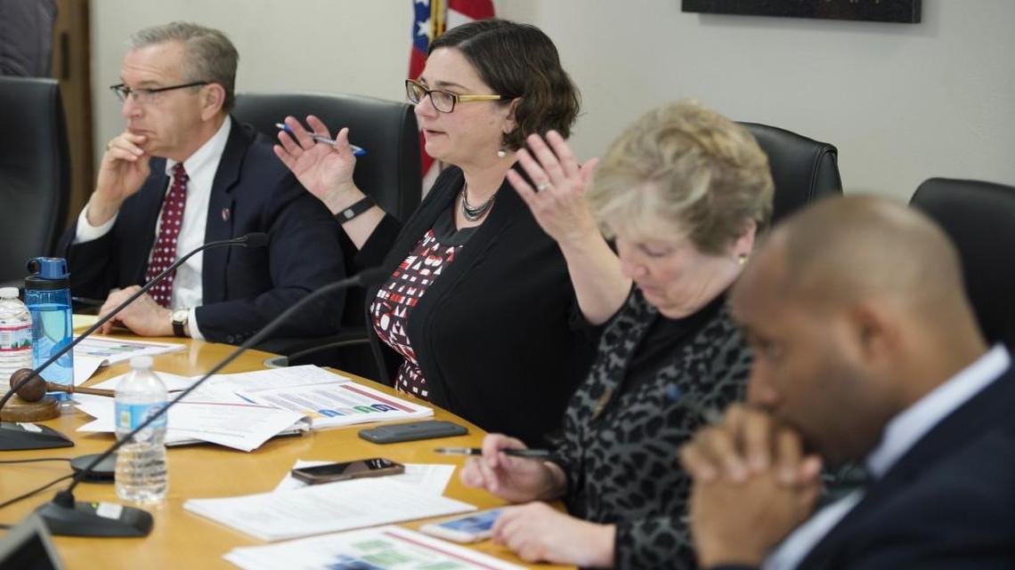 Kansas City Council member Jolie Justus (second from left) leads the Airport Committee, which needs to methodically review plans to build a new KCI terminal.