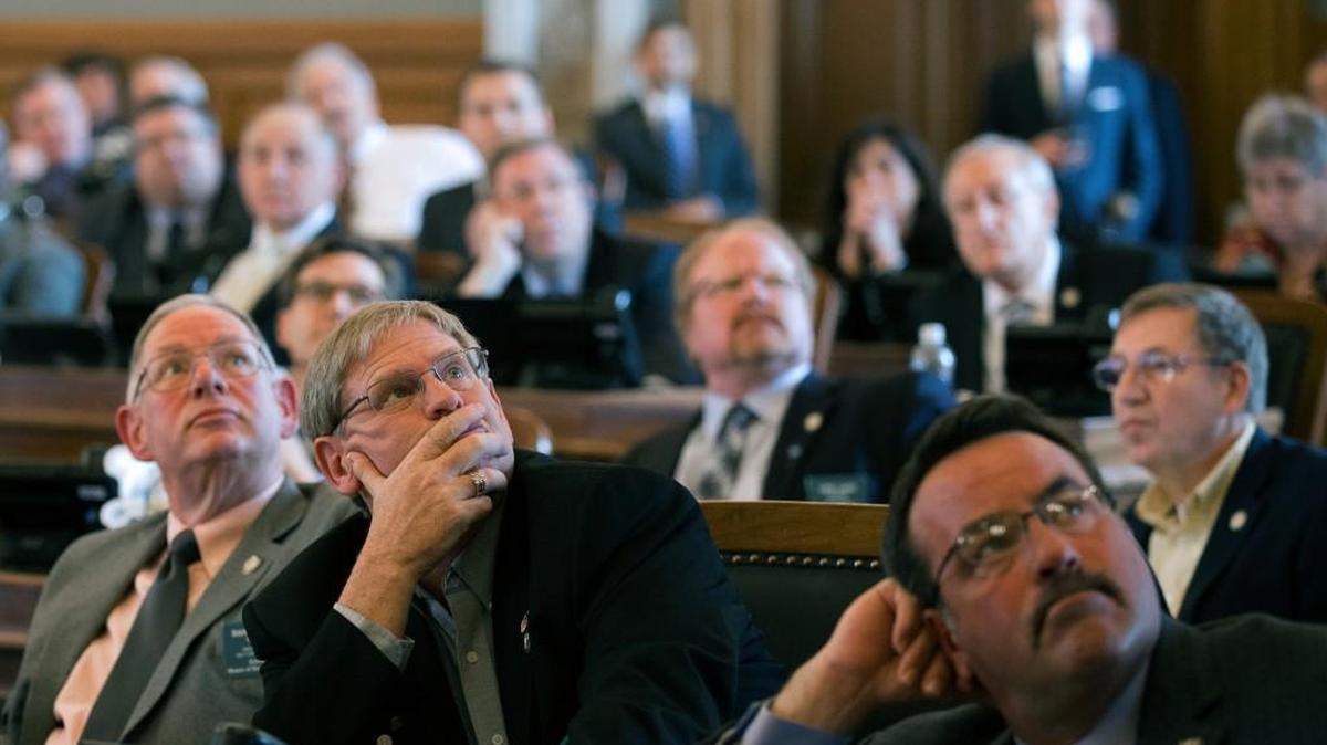 House republicans watch the voting board on the House floor, during an open vote on overriding Gov. Sam Brownback’s veto of a Medicaid expansion bill, Monday, April 3, 2017 at the Statehouse in Topeka, Kans. The measure failed by three votes.