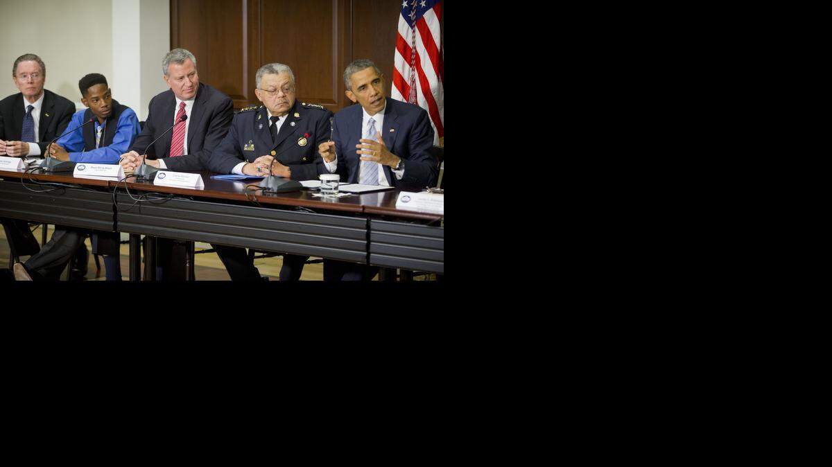 
President Barack Obama (right) held meetings on Ferguson Monday in Washington.
