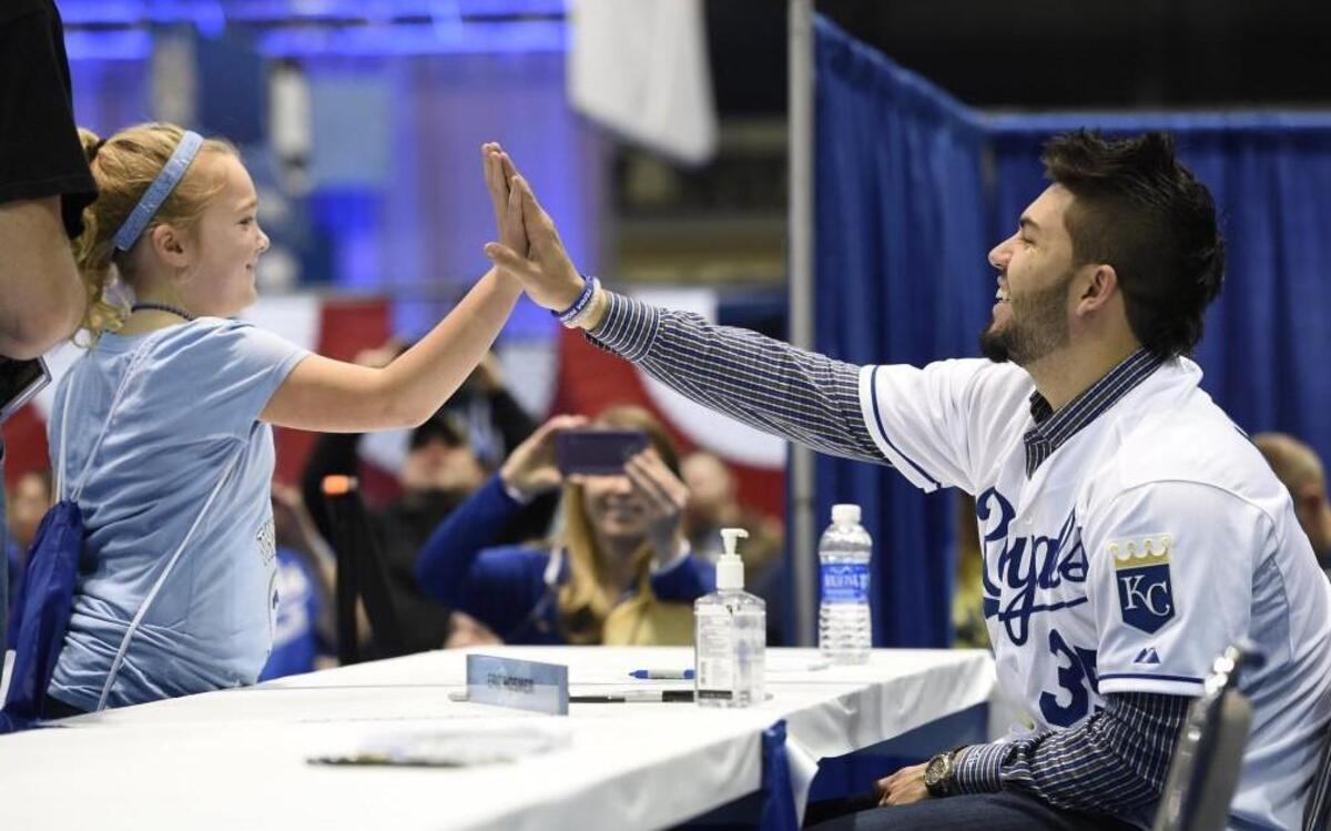 Eric Hosmer high-fived Marissa Roland, 9, at the autograph table during Kansas City Royals Fanfest last year at Bartle Hall.
