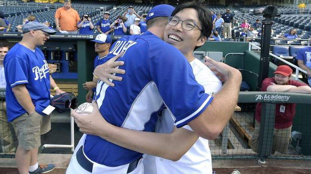 
Kansas City Royals fan SungWoo Lee got a hug from Royals pitcher Danny Duffy on Monday.
