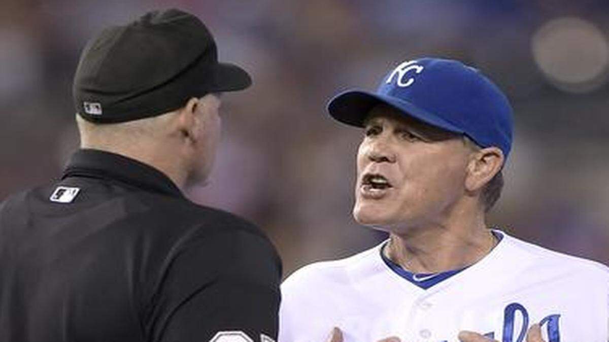 
Royals manager Ned Yost argued with umpires Ted Barrett and umpire Adam Hamari after the Twins' Brian Dozier was allowed to stay at second on an interference call that Royals second baseman Omar Infante interfered with base runner Sam Fuld during their July 29 game at Kauffman Stadium.
