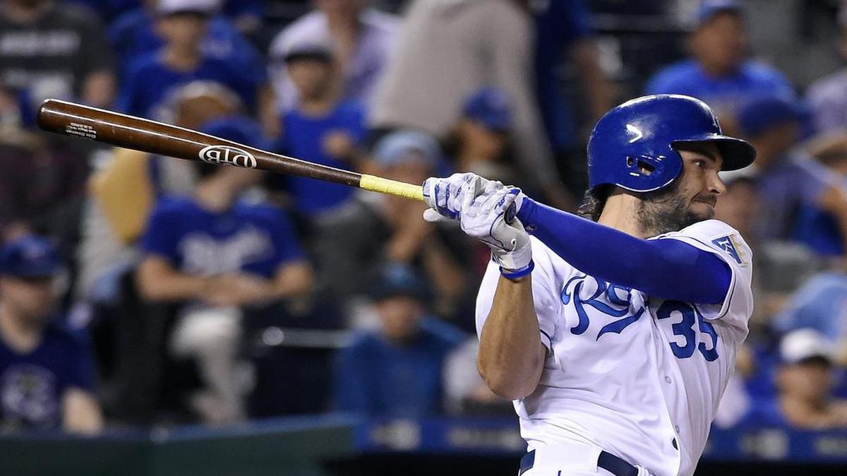 
The Royals' Eric Hosmer (35) follows through on a single in the first inning of Friday's baseball game at Kauffman Stadium.
