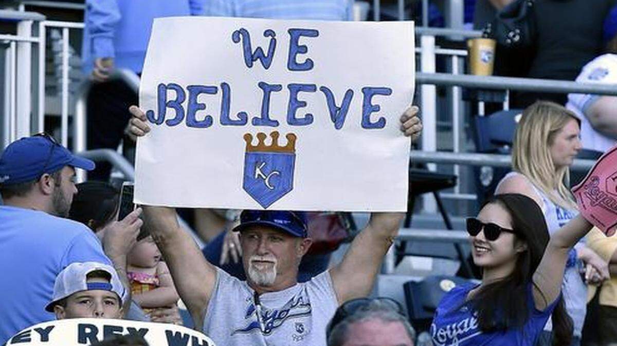 
A Kansas City Royals fan held a sign at the end of the Royals’ 5-2 win over the Detroit Tigers on Sunday.
