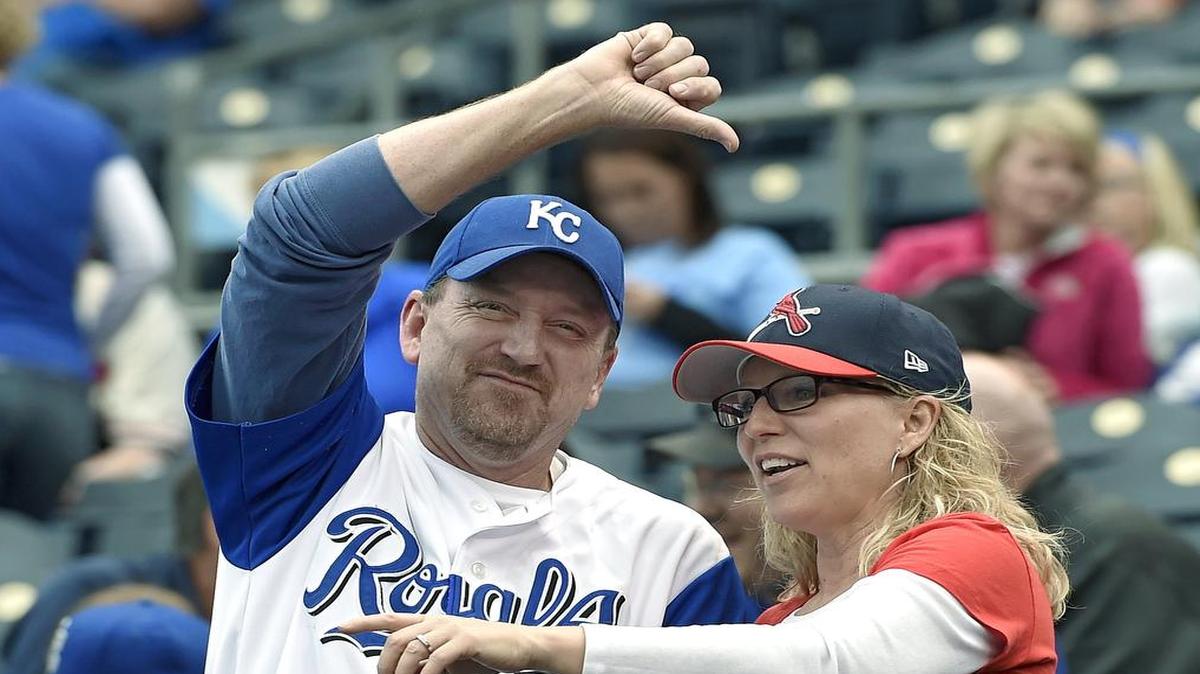 
Travis and Amy Talley of Olathe, Kansas were having a disagreement over their allegiances to the Royals and Cardinals before the May 22 baseball game at Kauffman Stadium.
