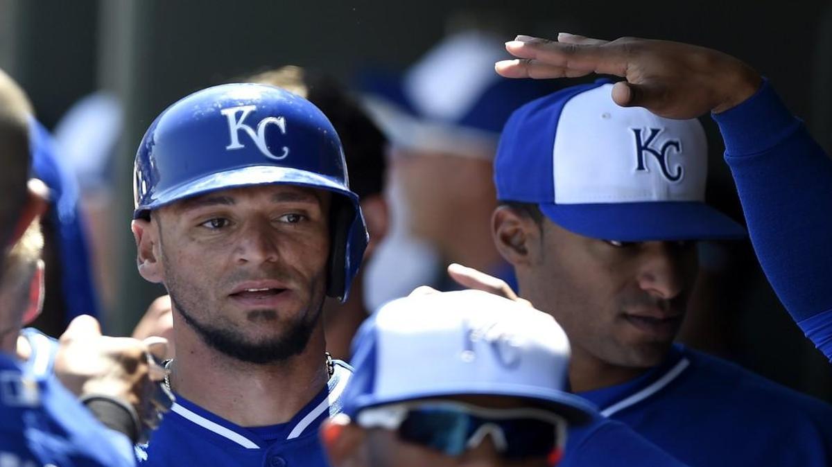 Kansas City Royals outfielder Paulo Orlando was congratulated in the dugout after scoring a run on a wild pitch during the Kansas City Royals and Los Angeles Dodgers spring-training game at Surprise Stadium last year.