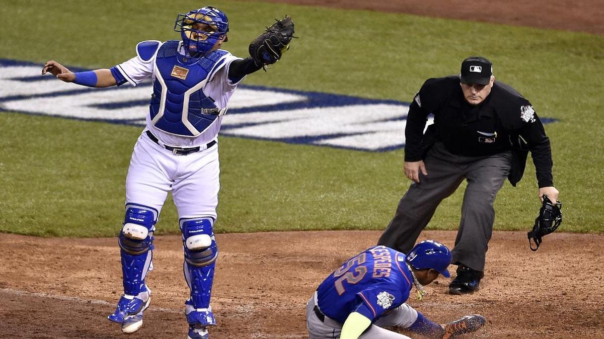 It appeared Royals catcher Sal Perez (left) had pine tar on his gear to help him improve his grip when throwing the ball.