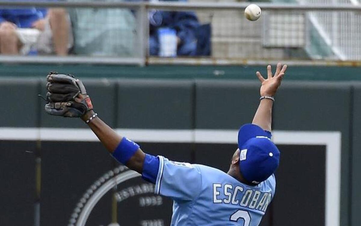 
On Sunday against the St. Louis Cardinals, Royals shortstop Alcides Escobar nearly pulled off a terrific catch, a bare-handed atttempt at a soft pop-up off the bat of Yadier Molina, but the ball glanced off Escboar’s hand.

