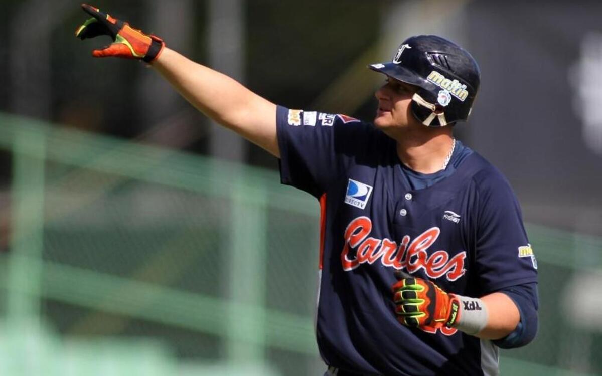 
Balbino Fuenmayor points to fans while running the bases after hitting a home run during a Caribbean Series baseball game against Cuba in February.
