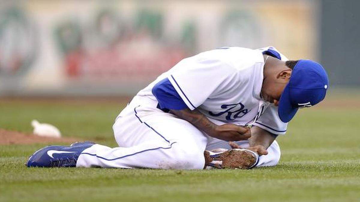 
Royals starting pitcher Yordano Ventura writhed in pain after experiencing cramping in his arm in the sixth inning on opening day at Kauffman Stadium.
