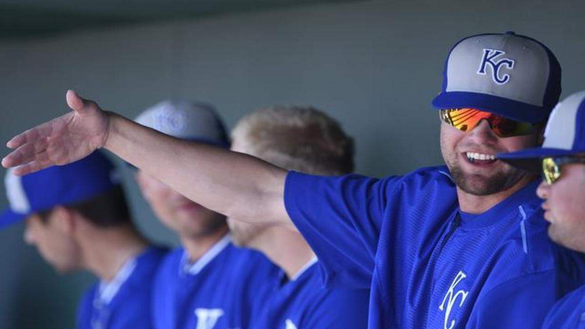 
Royals minor-league prospect Bubba Starling talked with teammates in the dugout before a spring training game with the Cleveland Indians Friday in Goodyear, Ariz.
