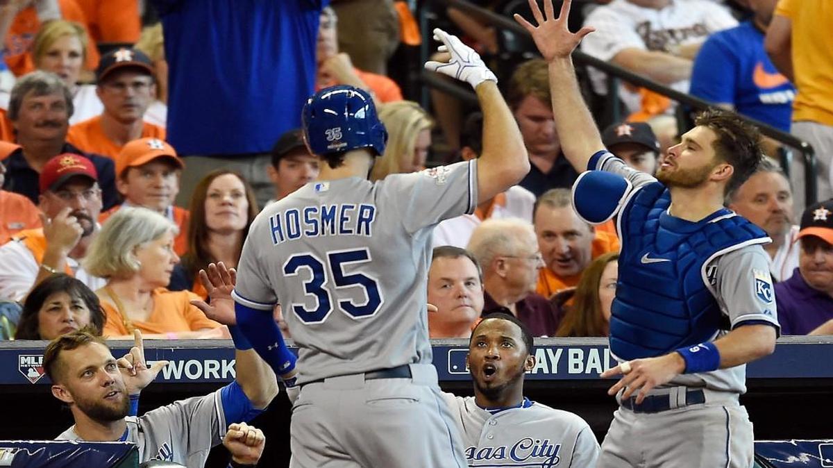 
Kansas City Royals first baseman Eric Hosmer was welcomed to the dugout after hitting a two-run home run in the ninth inning during Monday’s ALDS Game 4 at Minute Maid Park in Houston.
